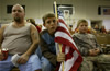 Spectators watch the Military Mayhem wrestling event at the Linton, Ind. National Guard Armory.