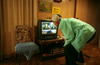 Richard Pate, my nearly blind grandfather, watches the 2000 election recount on CNN to see who won the election.