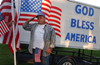 Army veteran Phillip Purtlebaugh of Bloomington, Ind., salutes the American flag during a patriotic vigil on the steps of the Monroe County Courthouse Sept. 25, 2001.