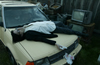 Dave, understanding he is no longer young, lies down on his dad's old broken down car, near some old televisions, and sleeps to dream inside a dream outside of society in a place that was formed by the dreams of a few.