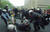 Washington D.C. Police try unsuccessfully to remove activists from an intersection who are protesting the IMF and World Bank meeting in Washington D.C., April 16, 2000