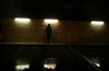 Dave at age 33 is as good as dead to those marketers that named him Generation X. Under the artificial lights of a parking lot he wears a trench coat and waits as the rain paints the night while dancing slowly and sadly.
